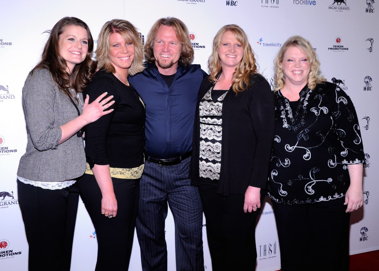 Reality show star who lived with 4 ‘sister wives’ is stuck in a bitter feud with exes over Arizona cabin